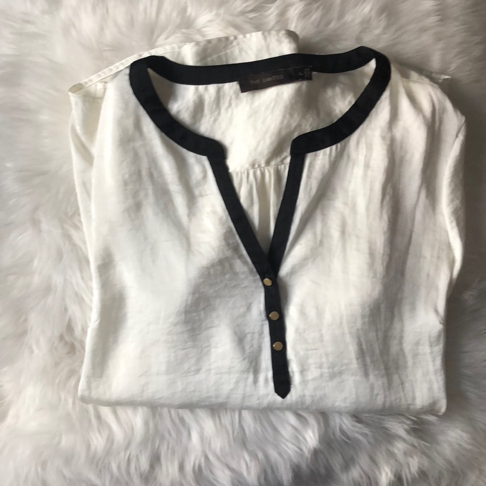 The limited cream flowing top